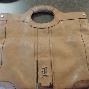 Authentic LAMB handbag by Gwen Stefani